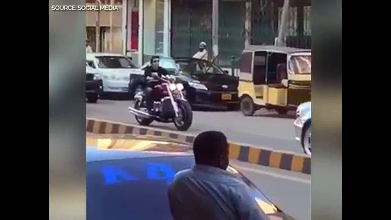 PTI's Faisal Vawda moves on heavy bike under heavy security