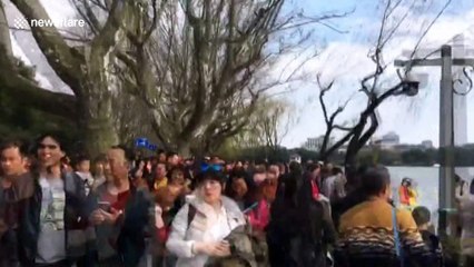 Crowds gather at Hangzhou West Lake during Chinese New Year