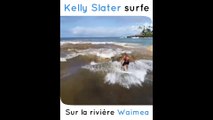 Kelly Slater surfe sur une rivière