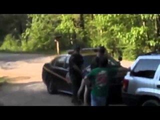 Mother Assaulted, Arrested After Stepping in Front of a Cop Who was About to Shoot Her Dog