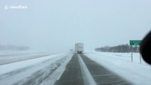 Lorry lifts up so much snow it blinds driver trying to overtake