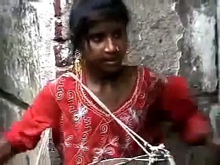 Indian Girl Sings and Plays Drum With Great Heart