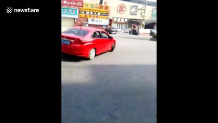 Chinese police arrest man drifting car on main road