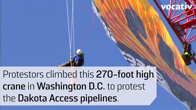 Activists Climb 270-Foot Crane In D.C. To Protest Trump