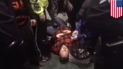 Pro-Trump Bible Believer knocked out by travel ban protester