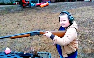Kid Experiences The Kick After Shooting A Shot Gun