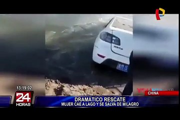 China: dramático rescate de mujer atrapada en lago congelado