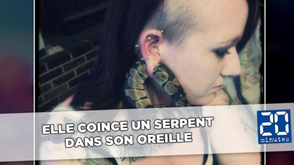 Elle coince un serpent dans son oreille