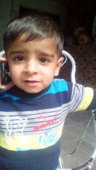 Very funny Must Watch Pakistani Baby calling on phone.