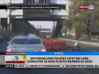 Motorsiklong palipat-lipat ng lane, sumalpok sa mga plastic barrier sa EDSA