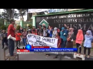 Para mahasiswa bagi bunga ajak masyarakat ikuti Pilpres 2014 - NET12