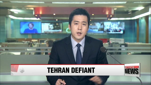 Iran challenges Trump sanctions with launch of 'roaring missiles'