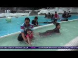 Keseruan Nizam Mengisi Waktu Liburan Berenang Bersama Keluarga
