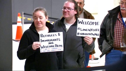 Iraqis land in the US with Trump's travel ban in limbo