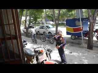 Man Takes Pizza Delivery Bike Across Iran