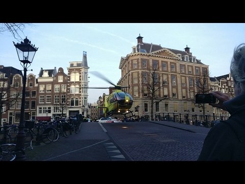 Emergency Helicopter Takes Off on Amsterdam Canal Bridge