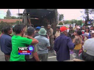 Video herunterladen: Luncuran Awan Panas Erupsi Gunung Sinabung Mencapai 3 KM - NET12