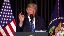 Trump reads immigration law and defends his order