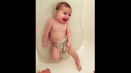Baby girl absolutely loves bath time