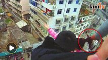 Man saves suicidal wife by pulling her ponytail