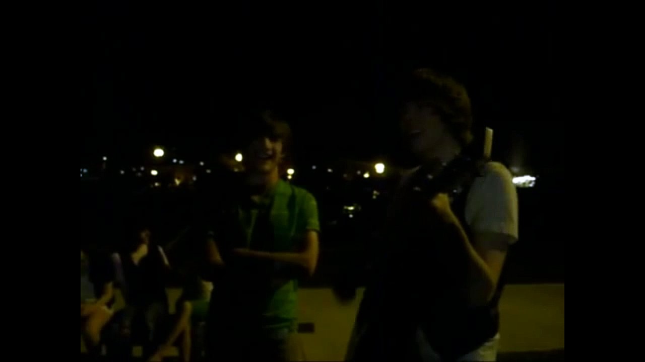 Mark Ryan outside singing with fans beatles dont let me down