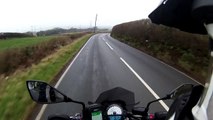 Motorcyclist loses control of bike on slippery road