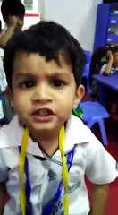 A Little Boy Is Singing A Song Very Well