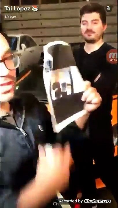 Johnny Marcos owner of Kustom Kontrollerz winning a car from Tai Lopez