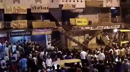 Ahmedabad:in Shah-e-Alam area, AMC removing of enchroachment on Shalimar Talkies road