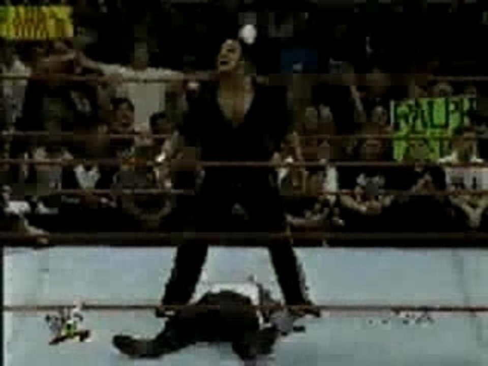 The Rock  turns on Corporation and attacks Vince McMahon