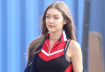 Gigi Hadid Bares Teeny-Tiny Waist In TommyLand Fashion Show