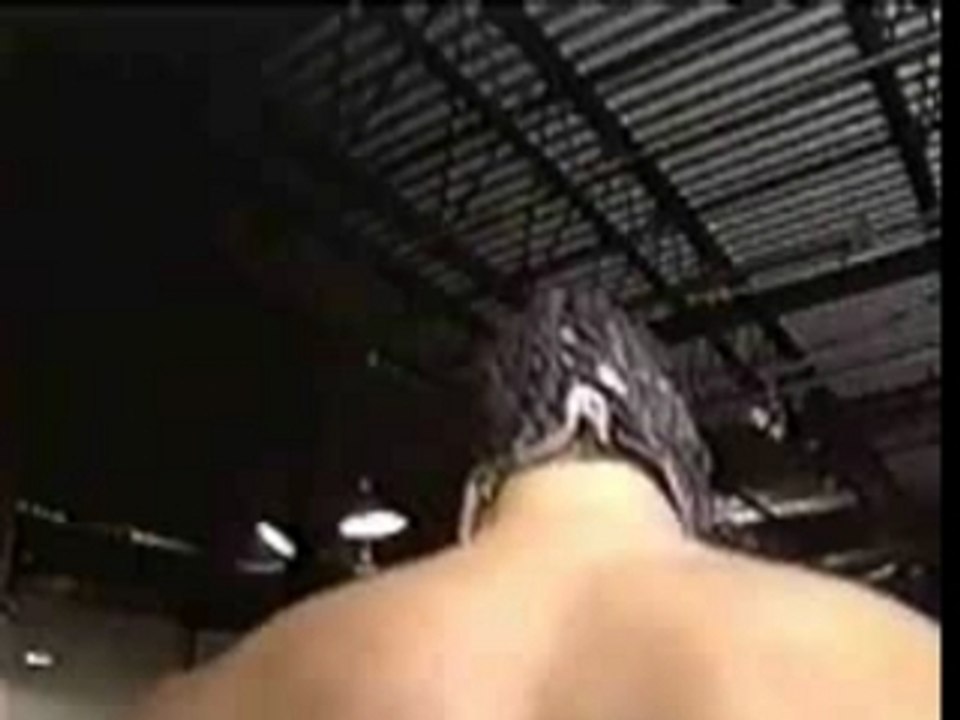 WWE - ECW-Rey Mysterio Jr.jumps off a balcony and Huracarana