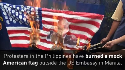 Filipinos burn mock American flag outside US Embassy