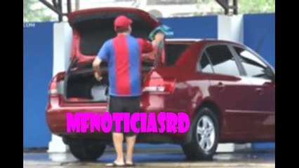 venezolano,periodista profesional se gana la vida en república dominicana,lavando carros