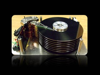 Inside of a hard drive (হার্ড ডিস্ক কিভাবে কাজ করে)