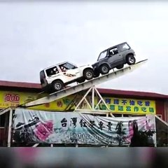 Two 4x4 cars perform balance stunt on huge seesaw!!