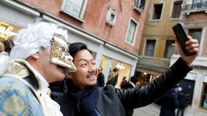 Venice Carnival begins in style