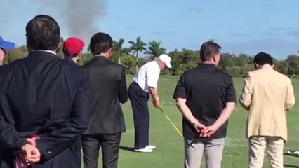 Watch Trump play golf at media-free event