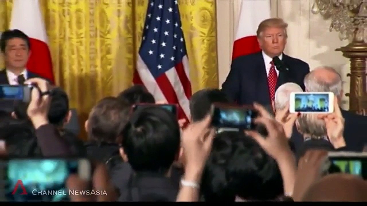 Trump welcomes Abe with warm White House embrace