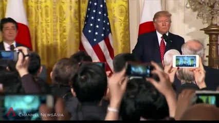 Trump welcomes Abe with warm White House embrace
