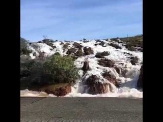 Water Floods Oroville Roads as Emergency Spillway Failure Expected