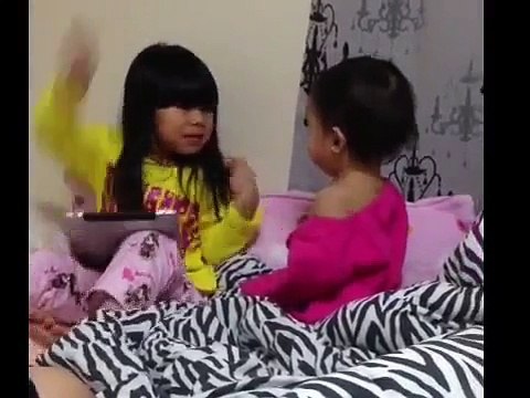 Fighting between two little sisters