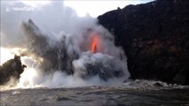 Incredible fire hose of lava flows from Kilauea volcano into the ocean