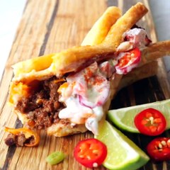 IT'S WORTH GETTING SLOPPY FOR THIS GRILLED CHEESE TACO