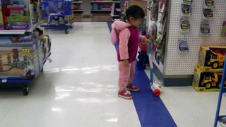 Girl Trying Baby Toy