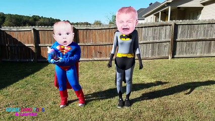 Batman and Superman Crying Baby Superheroes in Real Life Play Fight Over Giant Baby Bottle