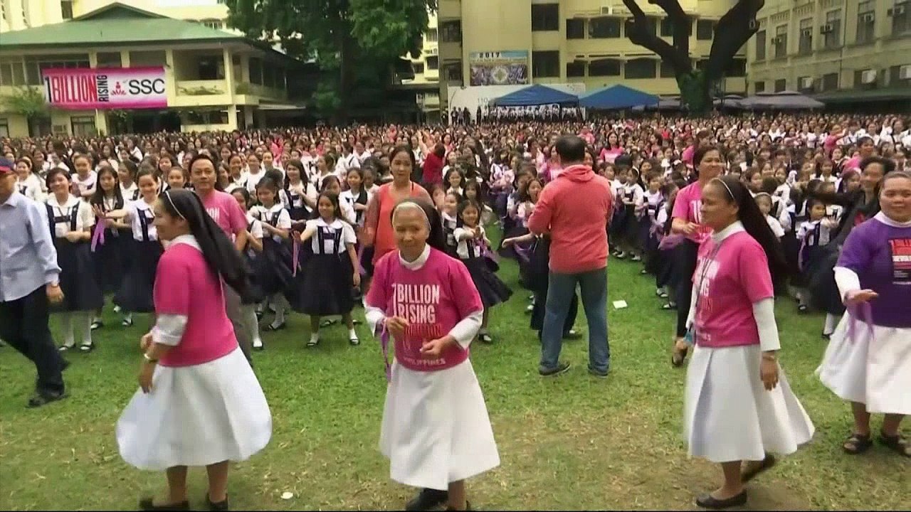 Nuns and schoolgirls dance in protest of violence to women