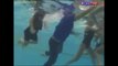 Waterpolo girls throw their coach in the pool
