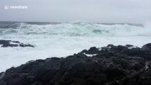 Daredevil cameraman gets hit by waves in British Columbia