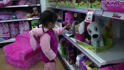Girl Testing The Teddy Bear